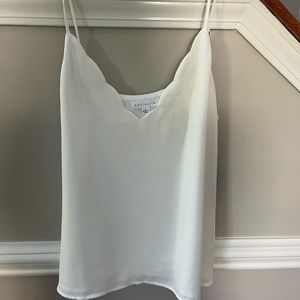 White scalloped shell/tank